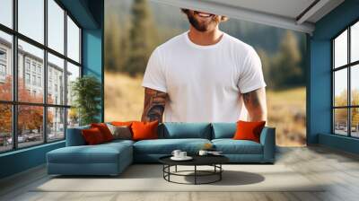 Male model posing outdoors with plain white canvas t-shirt mockup Wall mural