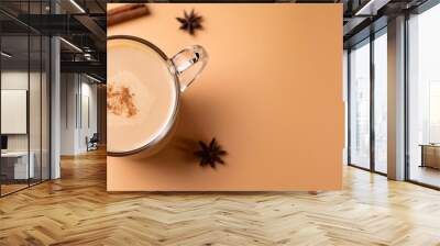 mockup hot chai latte on a peach background offering a warm and inviting backdrop for your creative projects Wall mural