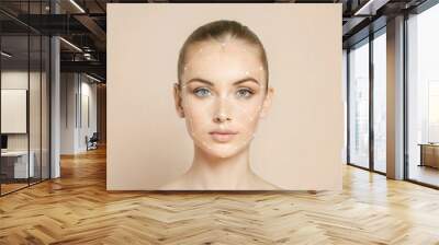 Facial Recognition: A serene woman's face adorned with biometric markers, signifying the future of identification technology and its impact on security and privacy.  Wall mural