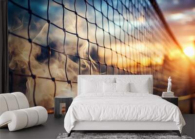 Golden Hour Volleyball Net: A close-up of a volleyball net against a vibrant sunset, with the sun's rays shining through the netting, creating a warm and inviting atmosphere. The soft. Wall mural