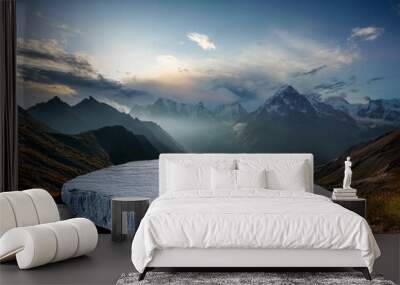 dramatic mountain background with empty stone platform for display product or mockup Wall mural