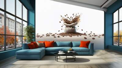 Coffee beans explode from a burlap sack spilling onto a white surface. Wall mural