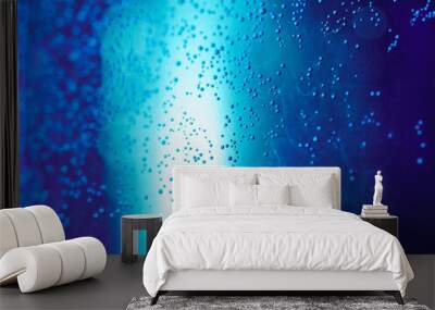 glowing blue liquid with bubbles - used as background Wall mural