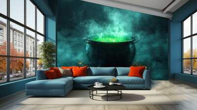 Cauldron with green glowing potion isolated on a dark foggy background Wall mural