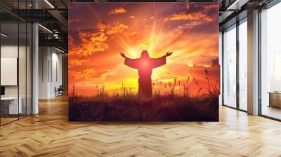 Silhouette of Jesus with arms raised up towards the sky in sign of redemption and spirituality Wall mural