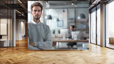 Young office worker in busines casual outfit in a modern office portrait. Wall mural