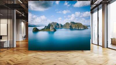 El Nido, Palawan, Philippines. Panoramic aerial view lonely tourist boat in open sea with exotic tropical Pinagbuyutan island standing out in ocean. Southeast Asia Bacuit archipelago Wall mural