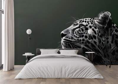 A black-and-white image of a leopard's profile, head tilted to the side, on a green background Wall mural