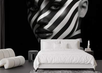 A fashion photo of a women in black and white against a stripe of lines. Monochromatic studio photography. Wall mural