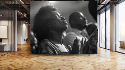 a group of black people worshipping, praising, in the church, hand up, praying and singing, black and white Wall mural