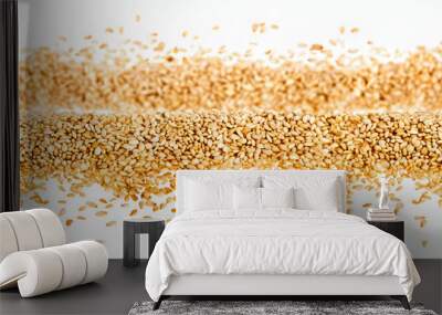 A white background with a row of sesame seeds on it. The sesame seeds are scattered all over the background, creating a sense of abundance and variety Wall mural