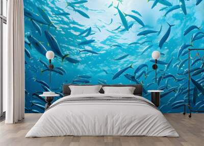 a wide view in ocean with a school of sardines shaped like a sphere Wall mural