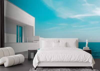 Architectural detail of white modern Mediterranean house over turquoise sea and blue sky background. Minimal architecture building detail in coastline by ocean or sea Wall mural