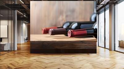 Bottles of red wine on a wooden shelf. banner background for winery, bar or shop Wall mural