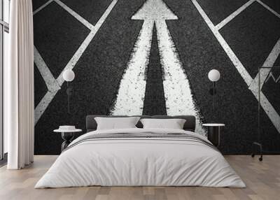 brilliant white twin direction arrows on a new black clean asphalt road surface with lane markings Wall mural