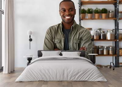 Business, people and lifestyle concept. Portrait of handsome african american man cross hands on chest and smiling pleased, own small shop, manage store with help of employees, white background Wall mural