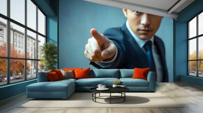 business man points his finger at you, Businessman pointing with finger with copy space Wall mural