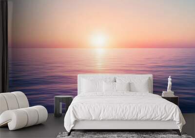 Calm ocean horizon with the sun setting, displaying pastel hues in the sky and water, embodying serenity and peace. Wall mural