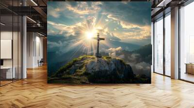 Crucifix at the top of a Mountain with Sunlight Breaking through the Clouds. Inspirational Christian Image. Wall mural