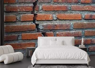 Damaged brick wall with jagged curved crack Wall mural