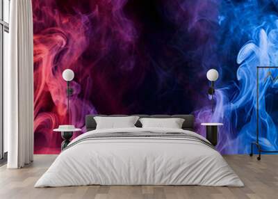 Dramatic smoke and fog in contrasting vivid red, blue, and purple colors. Vivid and intense abstract background or wallpaper. Wall mural