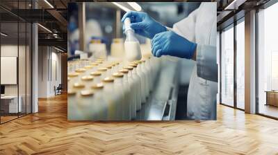 Food scientist testing milk samples of dairy products in the laboratory. Researchers are looking at the stratification of milk. Wall mural