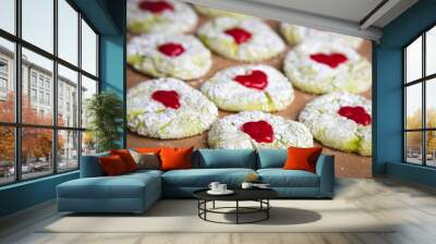 Grinch holiday cookies with powered sugar and red hearts Wall mural