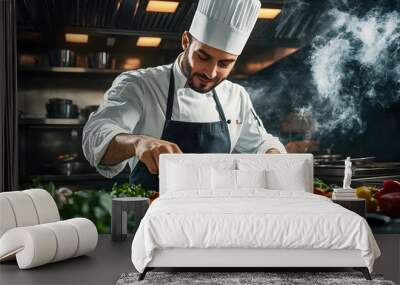 Male chef preparing vegetable vegetarian dish at a professional kitchen Wall mural