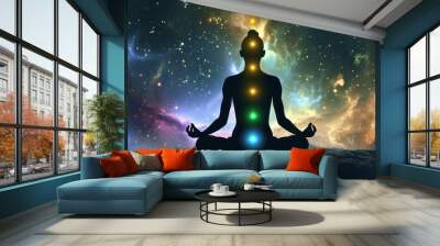 Yoga concept with copy space. Young woman seats in a lotus position. Colorful chakras on body. Mudra Yoga Energy.  human in yoga pose with chakras. Human energy body. Aura. Chakras. Yoga. Wall mural