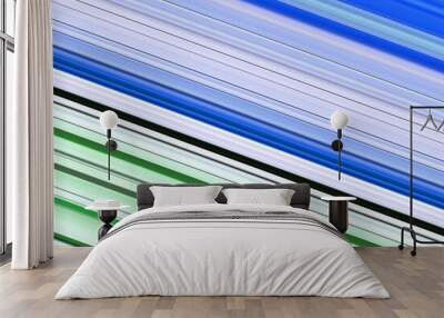 patterns and grid designs in vivid green and blue colours on a plain white background Wall mural