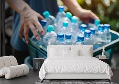 Person Holding a Plastic Container Full of Water Bottles Wall mural