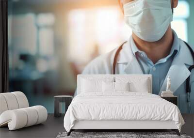 Physician at a healthcare facility, with an unfocused backdrop of a medical center. Wearing a protective mask on the face Wall mural