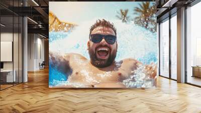 plus sized man excited going down the waterslide, summer fun Wall mural