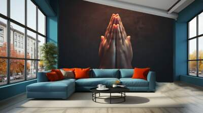 Praying hands with faith in religion and belief in God on dark background. Power of hope or love and devotion. Namaste or Namaskar hands gesture. Prayer position. Wall mural