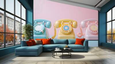 Row of pastel colored retro telephones Wall mural