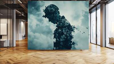 silhouette of a sad military man which has PTSD, formed from piecies of jigsaw puzzle falling apart a little Wall mural