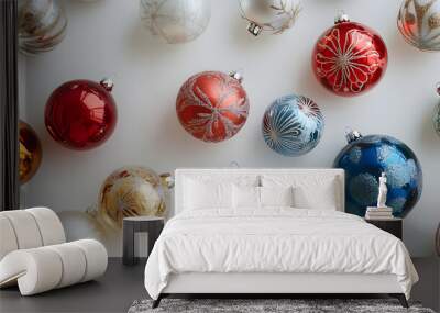 top view of different, colorful christmas baubles lying against white bacgkround Wall mural