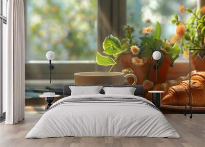 Two croissants, a cup of coffee, two plants in pots on the windowsill.  Wall mural