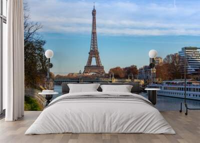 Eiffel tower and Seine with clouds Wall mural