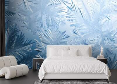 Winter frost patterns on glass. Ice crystals or cold winter background. Wall mural