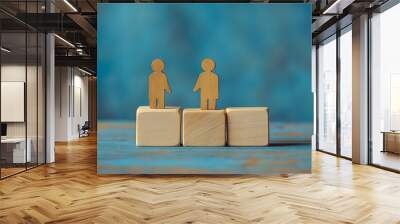 Wooden blocks with a family time message against a blue background serving as a symbolic image Includes copy space for customization Wall mural