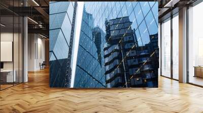 Modern abstract reflections in glass fronted commercial office buildings in the financial district of the British capital London. Wall mural