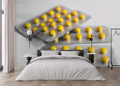 yellow vitamin tablets close-up. for the treatment of disease Wall mural