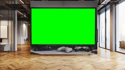 TV w/Green Screen on Desk With Gaming Consoles Wall mural