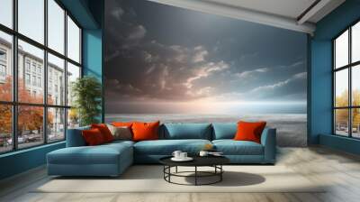 The tumultuous sky looms over a restless ocean landscape, capturing a stark contrast between calm and chaos Wall mural