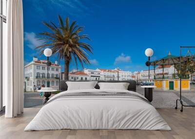 the central square of nazare with pavilion and nossa senhora da nazare church on the background. por Wall mural