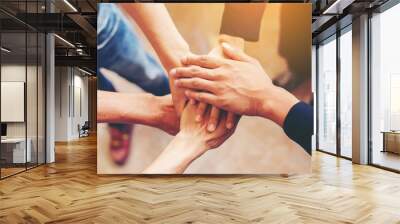  Concept of teamwork: Close-Up of hands business team showing un Wall mural