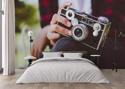 Close-up of hipster woman with vintage camera. Wall mural