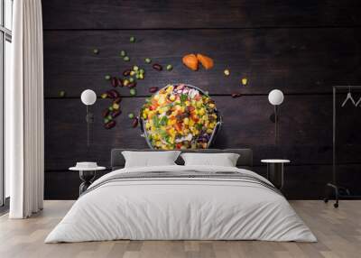 Fresh salad with corn and mixed on wooden background top view. H Wall mural