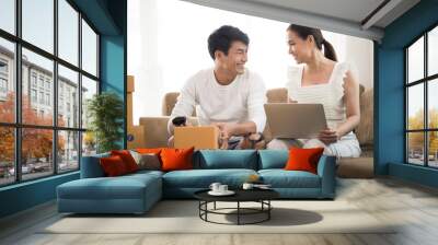 happy couple at home office with online business, marketing online and freelance job Wall mural